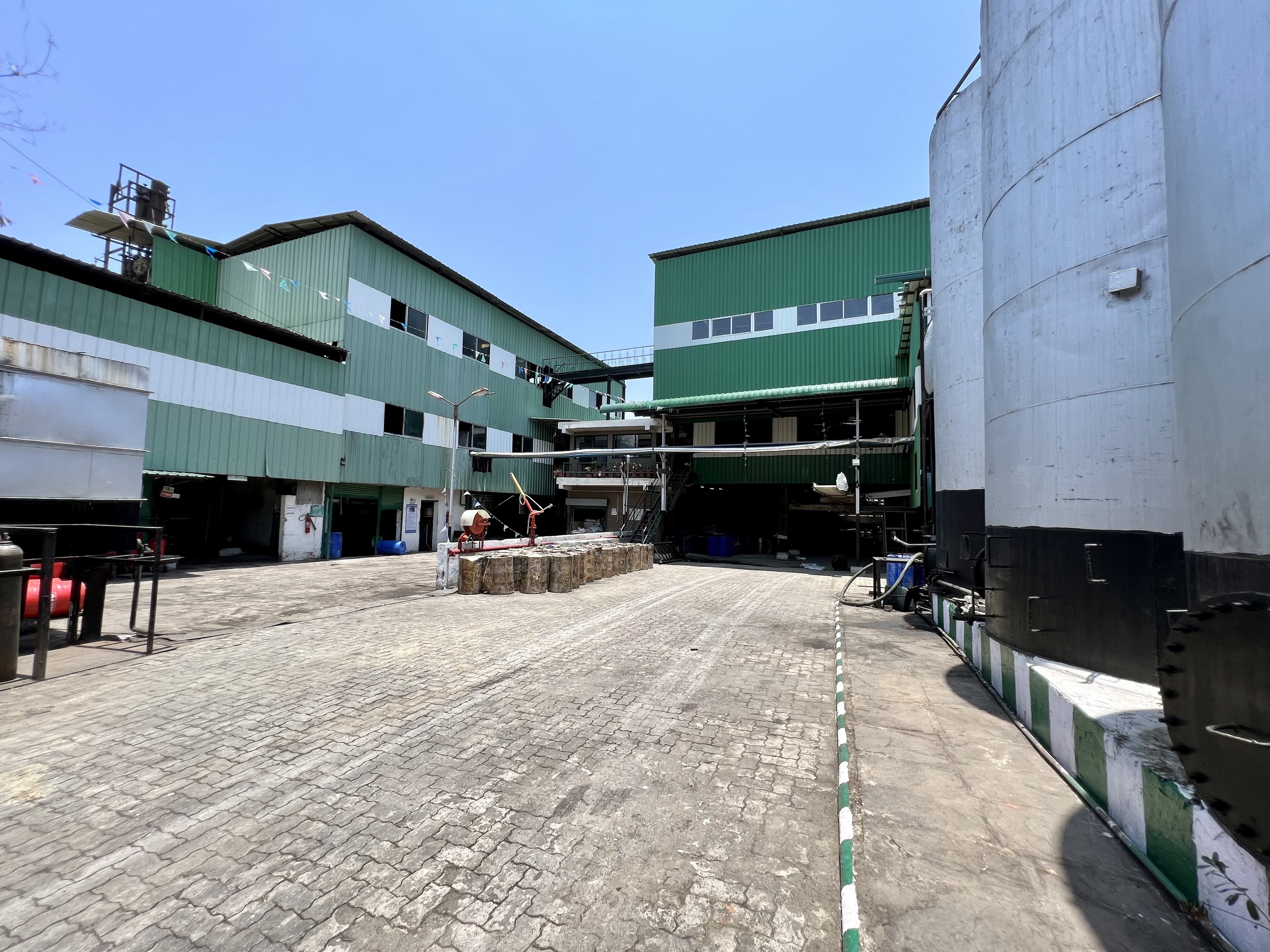 The central courtyard of the Viscus Oils plant at Mangalya, Indore, with drum storage and process buildings